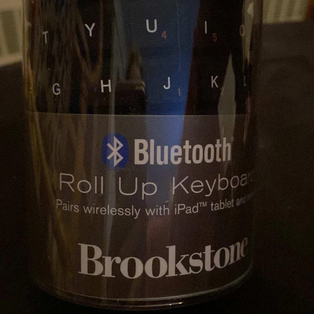 Never used- Brookstone Bluetooth roll up keyboard!